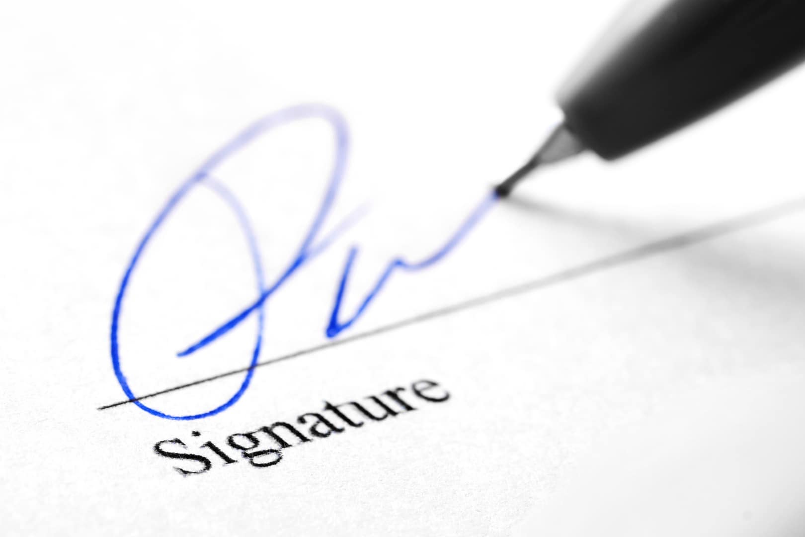 An individual signs an Oregon Advance Directive for Health Care.